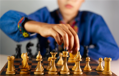  Student playing chess